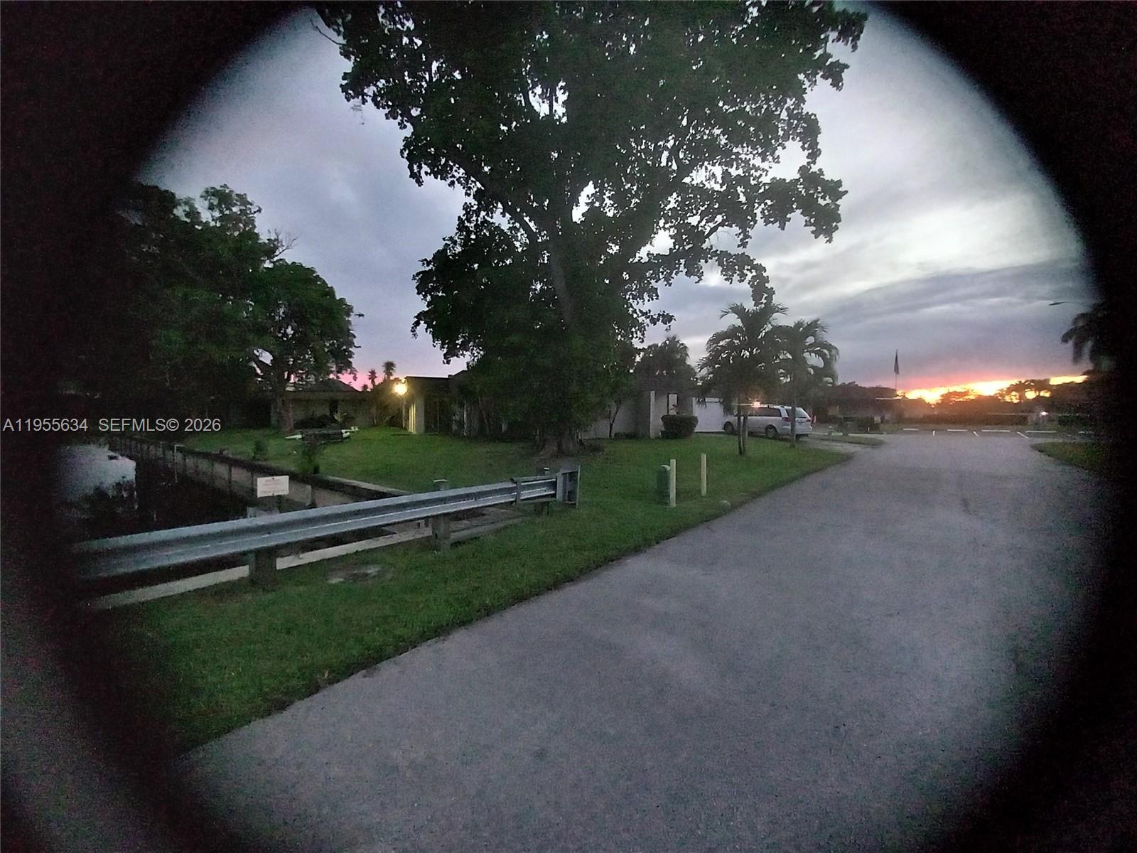 5700 White Hickory Circle Tamarac, FL 33319 - Photo 14 of 18 a view of a golf course with a lake