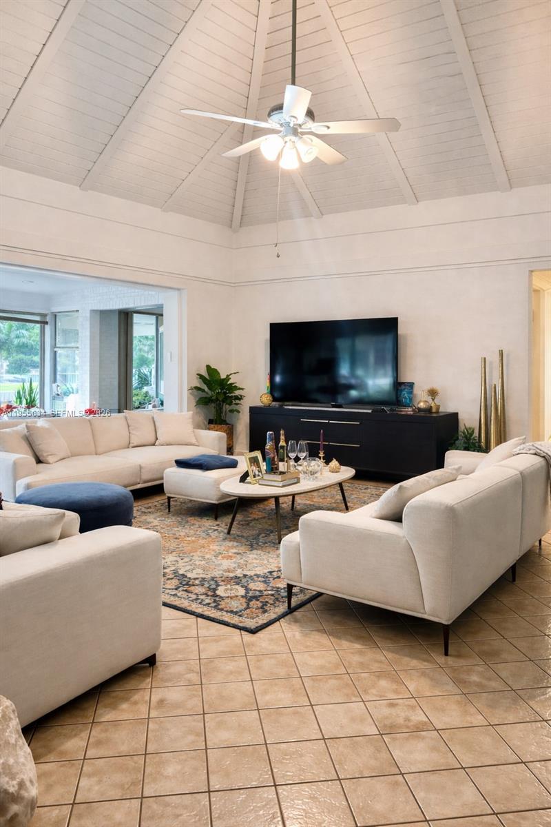 5700 White Hickory Circle Tamarac, FL 33319 - Photo 4 of 18 a living room with furniture and a flat screen tv