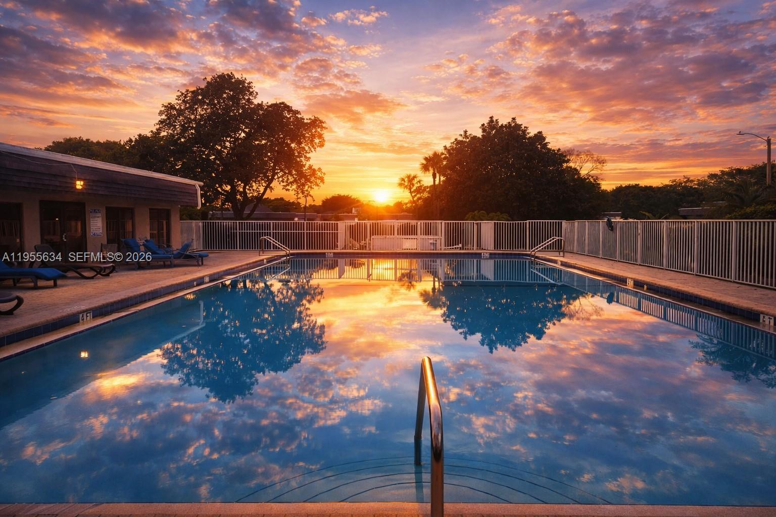 5700 White Hickory Circle Tamarac, FL 33319 - Photo 8 of 18 a view of back yard with swimming pool in outdoor seating