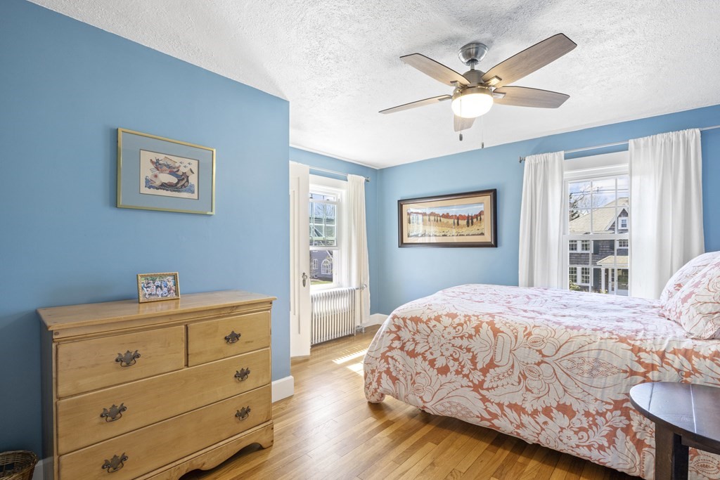 15 Pickwick Road Marblehead, MA 01945 - Photo 18 of 30 a bedroom with a bed and a window