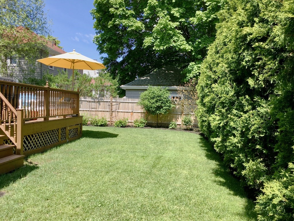 15 Pickwick Road Marblehead, MA 01945 - Photo 28 of 30 a view of backyard with a garden and deck