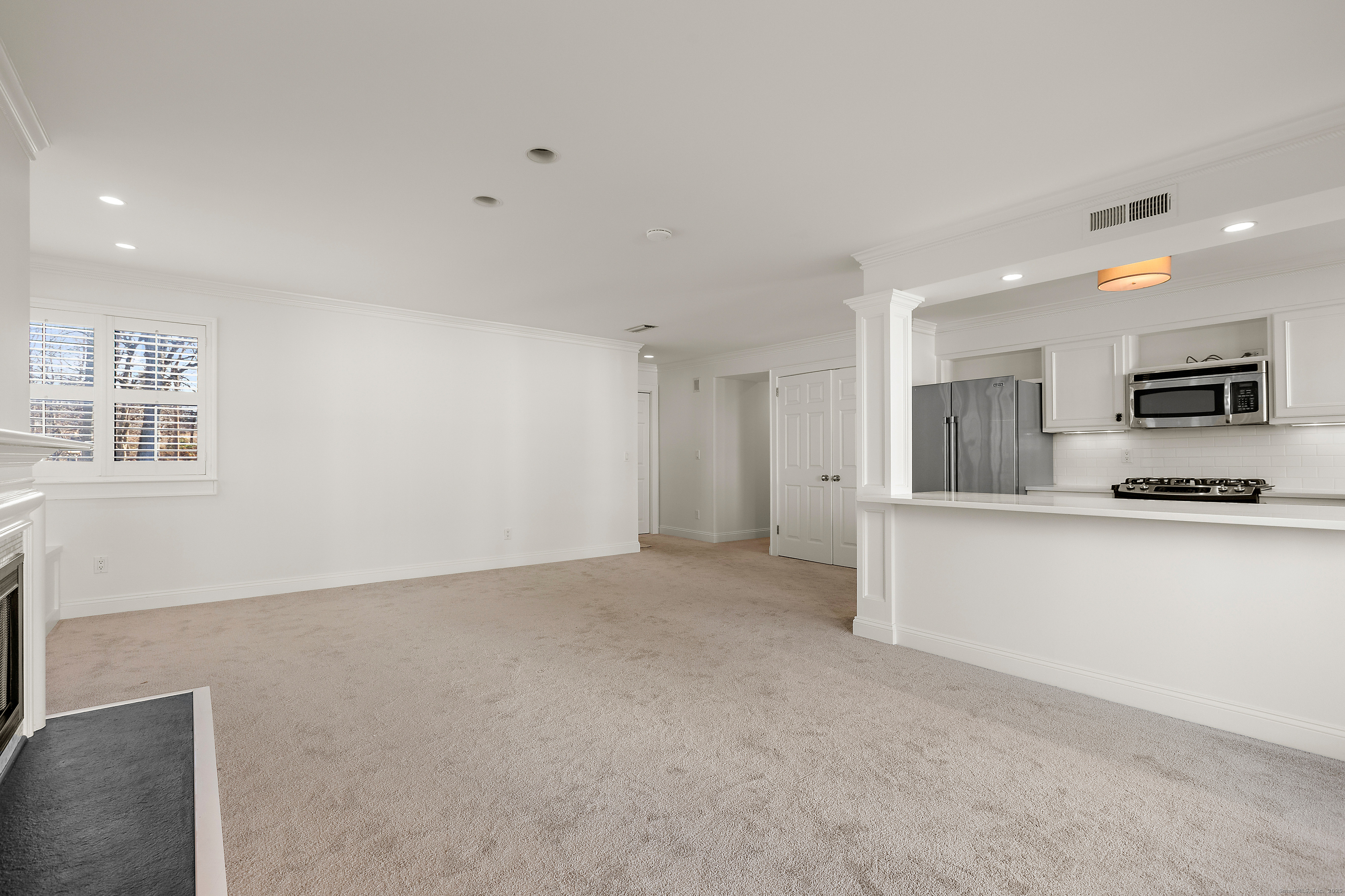 133 Rowayton Woods Drive, Unit 133 Norwalk, CT 06854 - Photo 10 of 40 Living Room looking into Kitchen