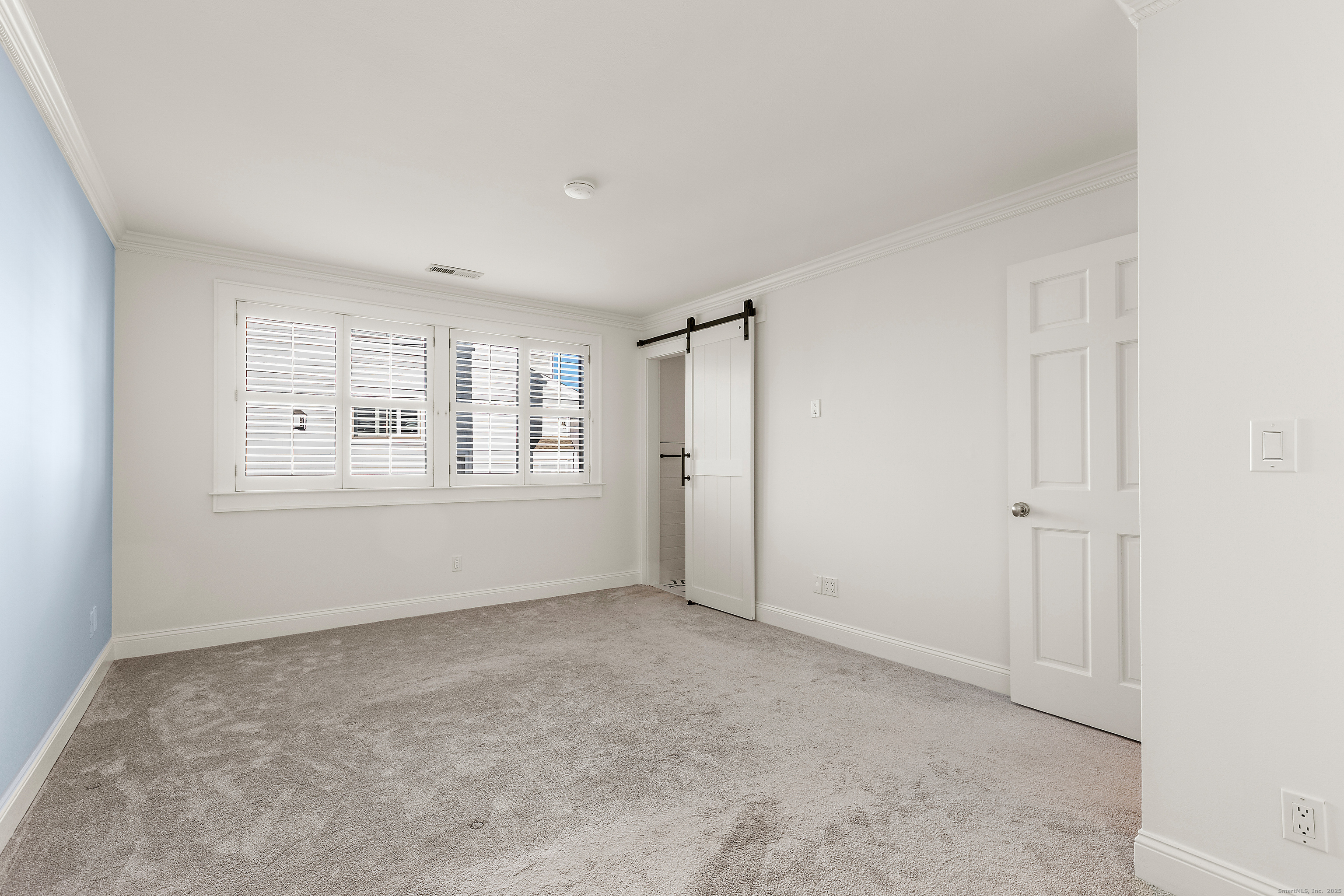 133 Rowayton Woods Drive, Unit 133 Norwalk, CT 06854 - Photo 22 of 40 Primary Bedroom has plantation shutters & Full Bathroom