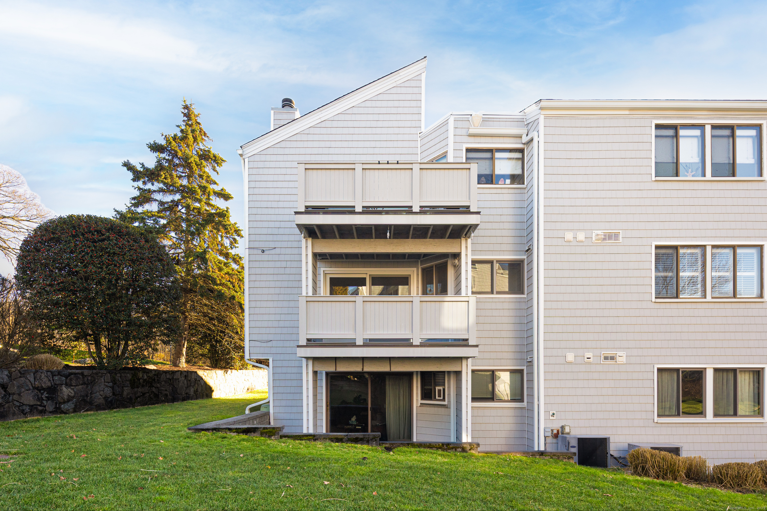 133 Rowayton Woods Drive, Unit 133 Norwalk, CT 06854 - Photo 3 of 40 Middle deck is covered w/ lake view