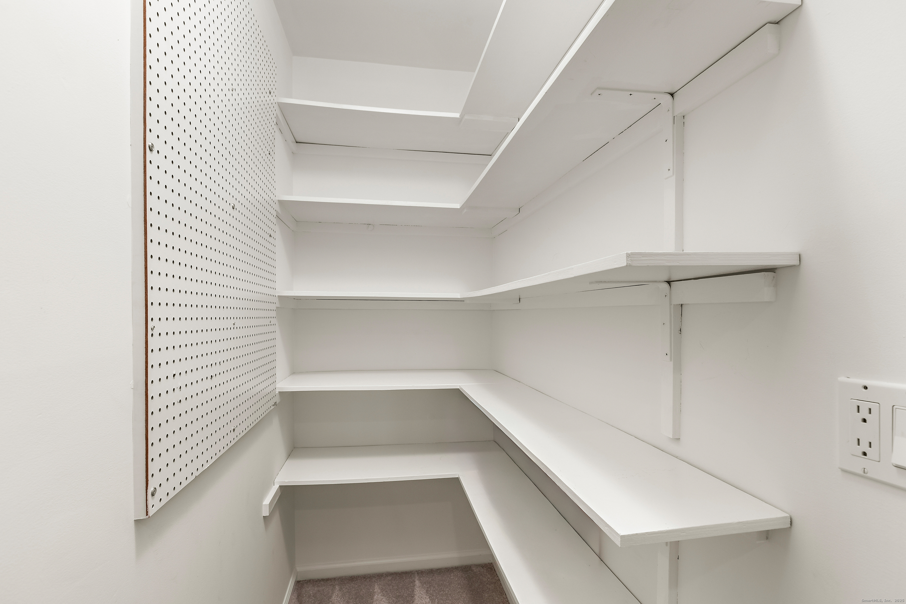 133 Rowayton Woods Drive, Unit 133 Norwalk, CT 06854 - Photo 30 of 40 Large Hallway storage closet