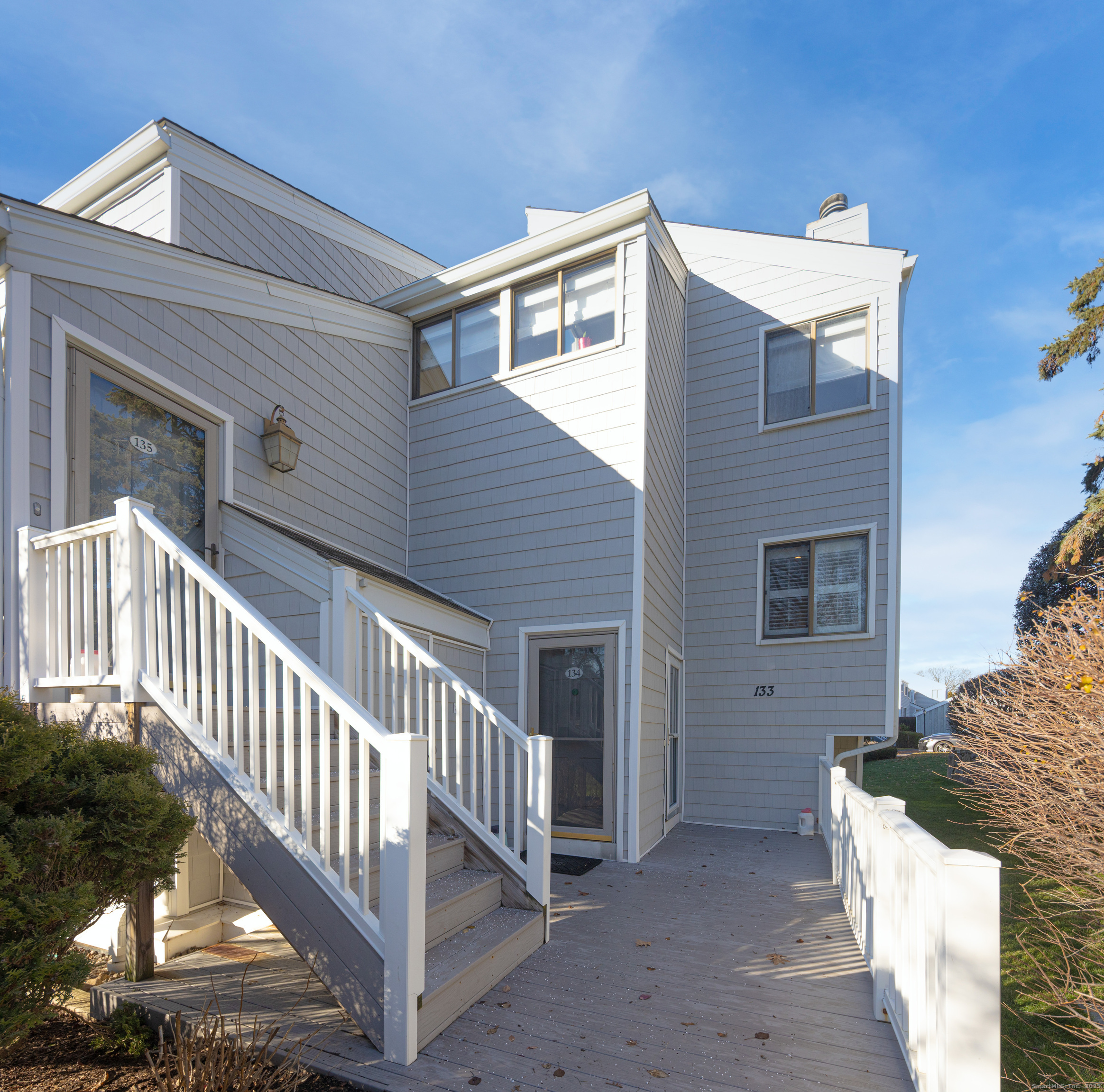 133 Rowayton Woods Drive, Unit 133 Norwalk, CT 06854 - Photo 6 of 40 Outside private walkway is bluestone & trex