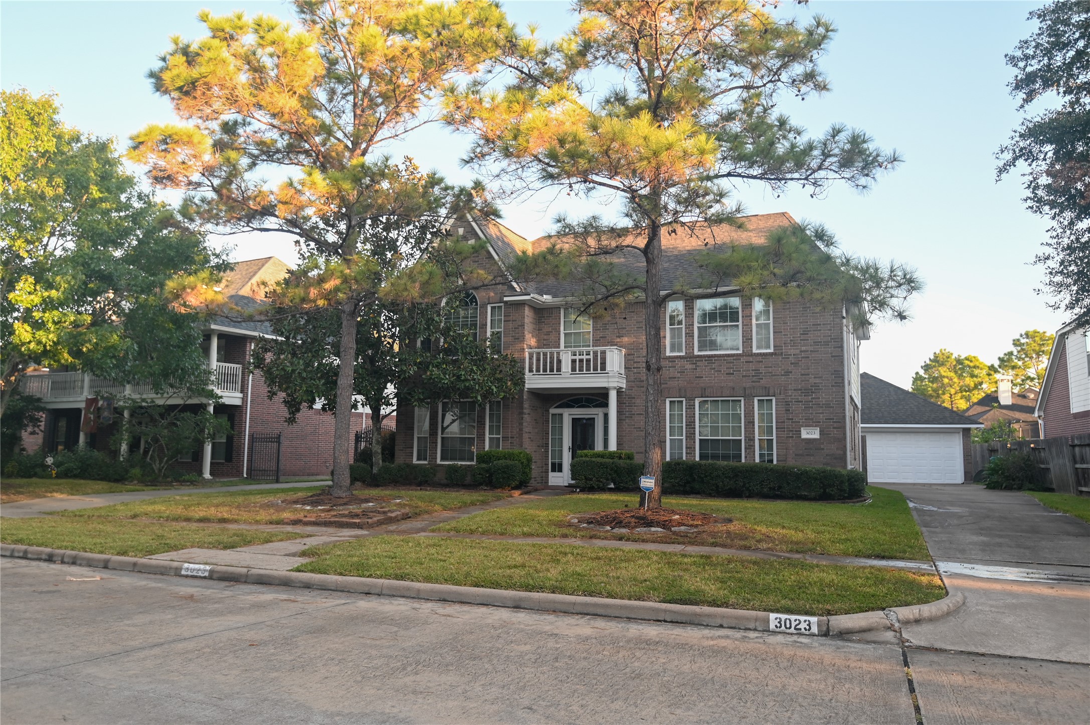 3023 Hidden Mist Court Pearland, TX 77584 - Photo 1 of 24 a front view of a house with a yard