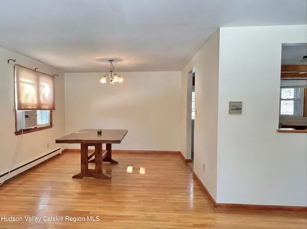 a view of a livingroom with furniture and window