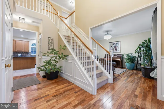 a view of entryway with wooden floor