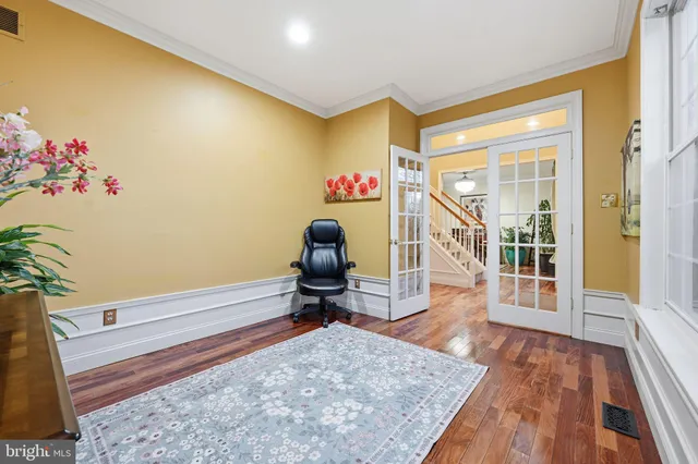 a view of entryway with wooden floor