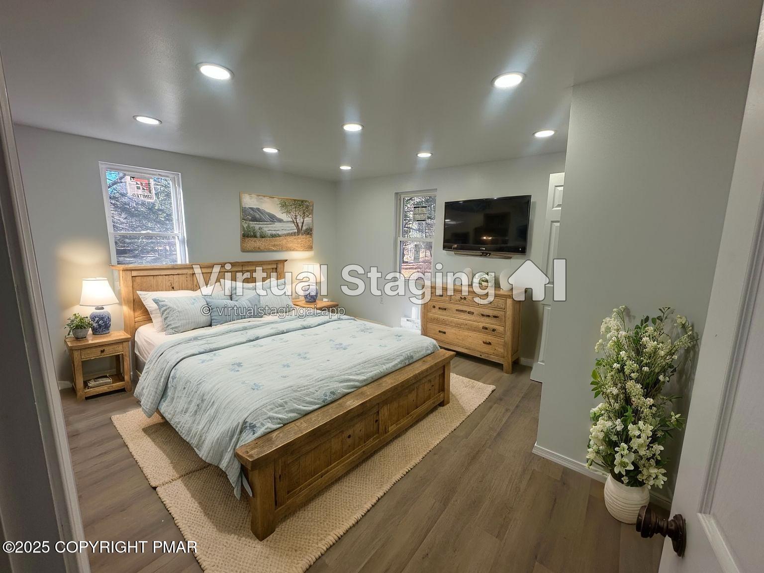 105 Glenmere Road Canadensis, PA 18325 - Photo 14 of 28 a bedroom with a bed window and a television