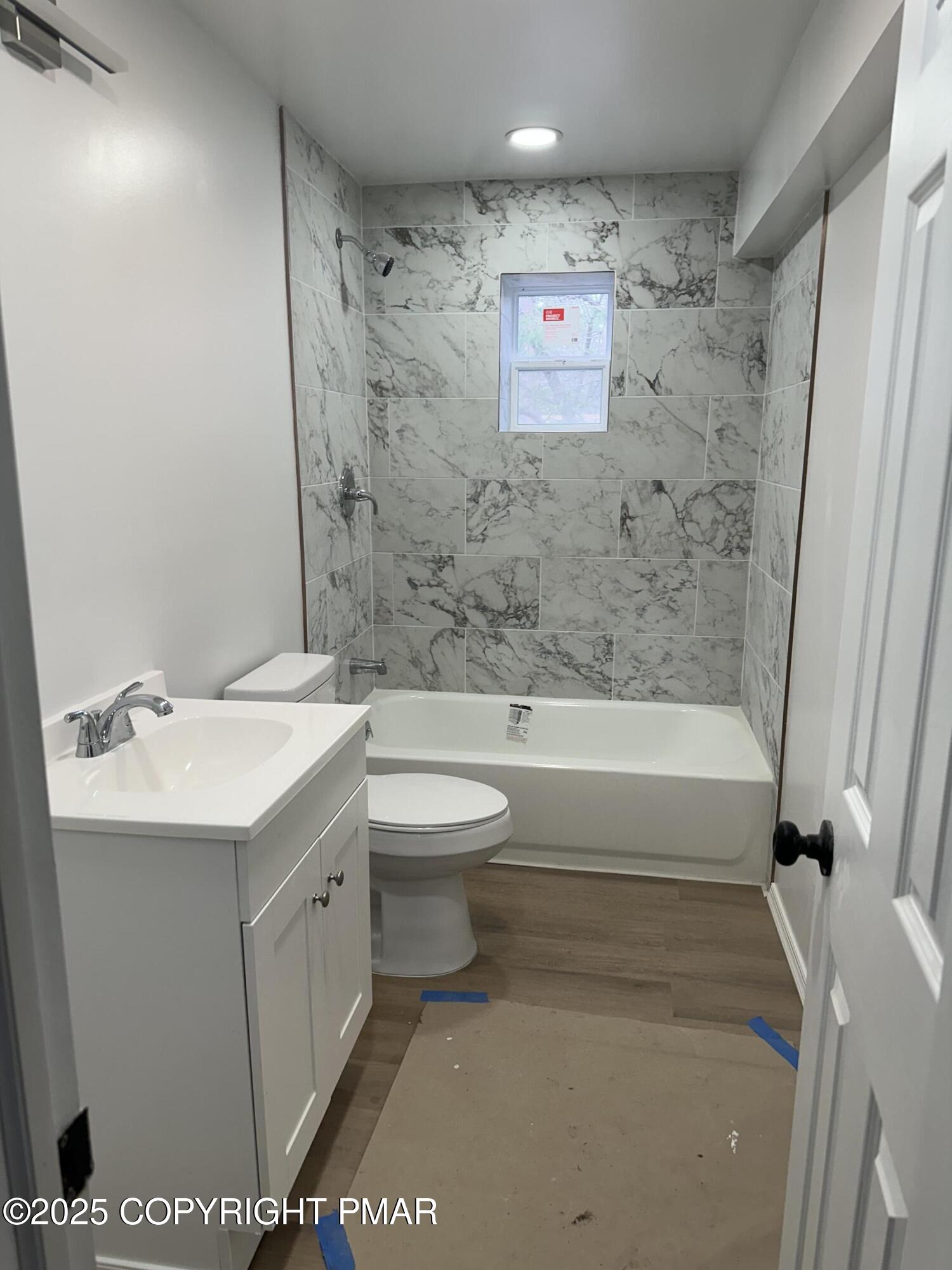 105 Glenmere Road Canadensis, PA 18325 - Photo 21 of 28 a bathroom with a sink a toilet and shower