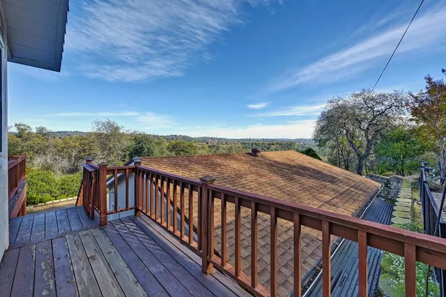 a view of a chairs on the roof deck