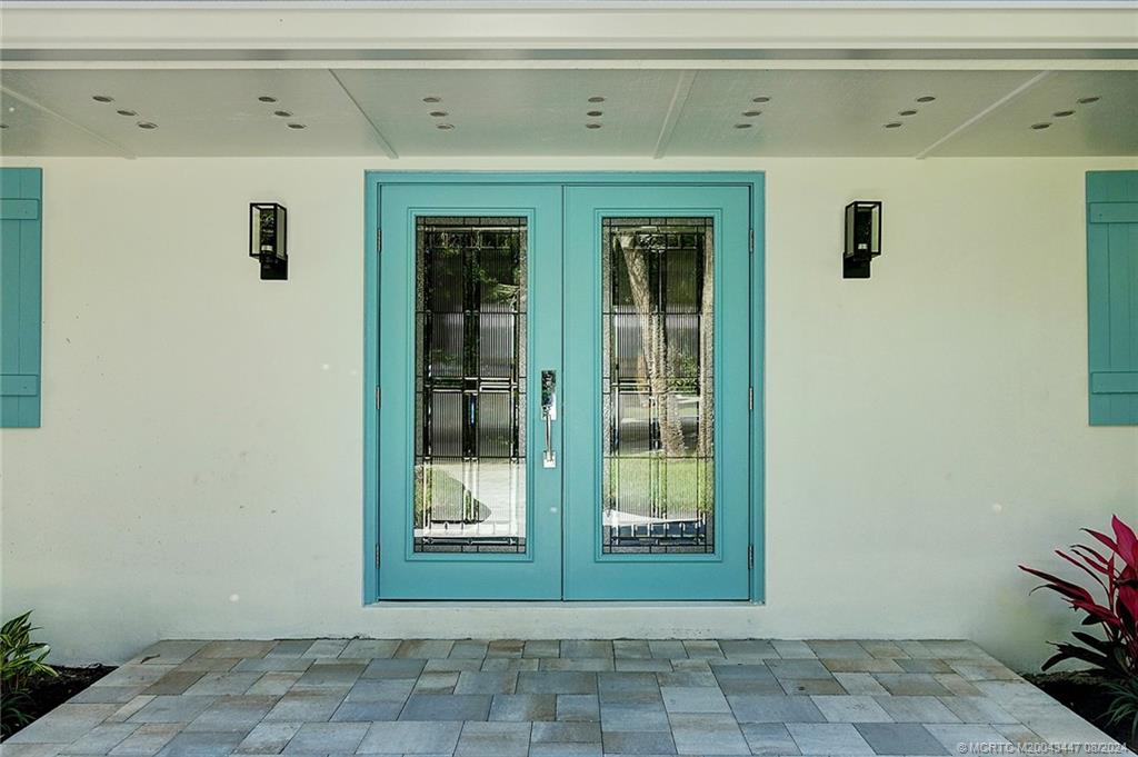55 North Sewalls Point Road Sewall's Point, FL 34996 - Photo 3 of 49 New impact doors & windows