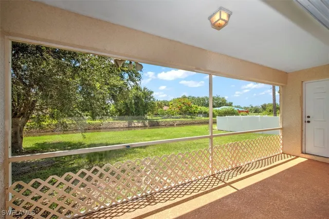 a view of a room with a large window