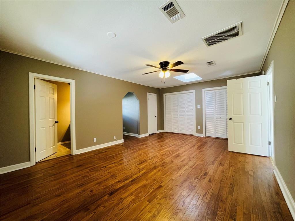 5000 Barbara Road River Oaks, TX 76114 - Photo 9 of 11 a view of an empty room with window and wooden floor