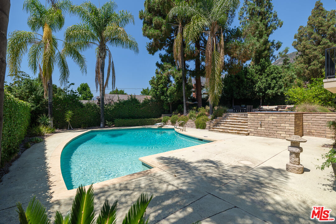 3363 Monterosa Drive Altadena, CA 91001 - Photo 5 of 10 a view of a swimming pool with a patio