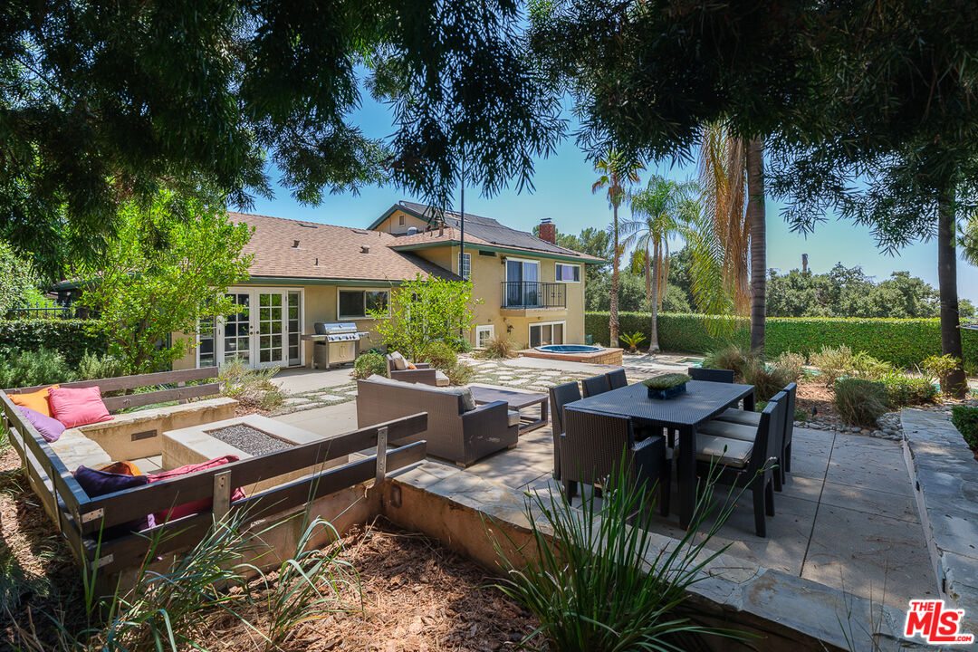 3363 Monterosa Drive Altadena, CA 91001 - Photo 9 of 10 a view of a patio with table and chairs and potted plants