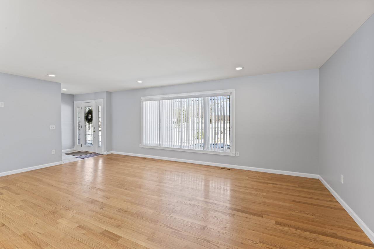 6221 West Vienna Road Clio, MI 48420 - Photo 15 of 41 Gleaming hardwoods