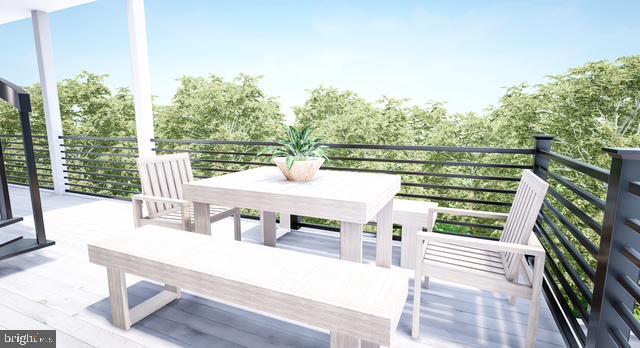Lot#2 Exeter Road Ocean City, MD 21842 - Photo 10 of 27 a view of a balcony with two chairs and a table