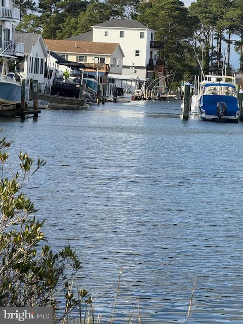Lot#2 Exeter Road Ocean City, MD 21842 - Photo 17 of 27 a cars parked in front of a building