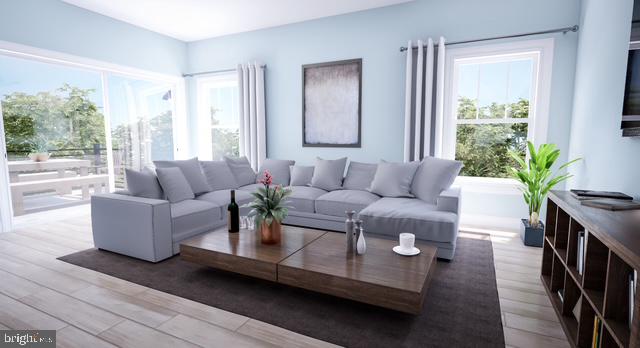 Lot#2 Exeter Road Ocean City, MD 21842 - Photo 8 of 27 a living room with furniture and a large window