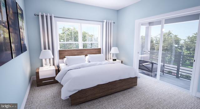 Lot#2 Exeter Road Ocean City, MD 21842 - Photo 9 of 27 a spacious bedroom with a bed and next to a window