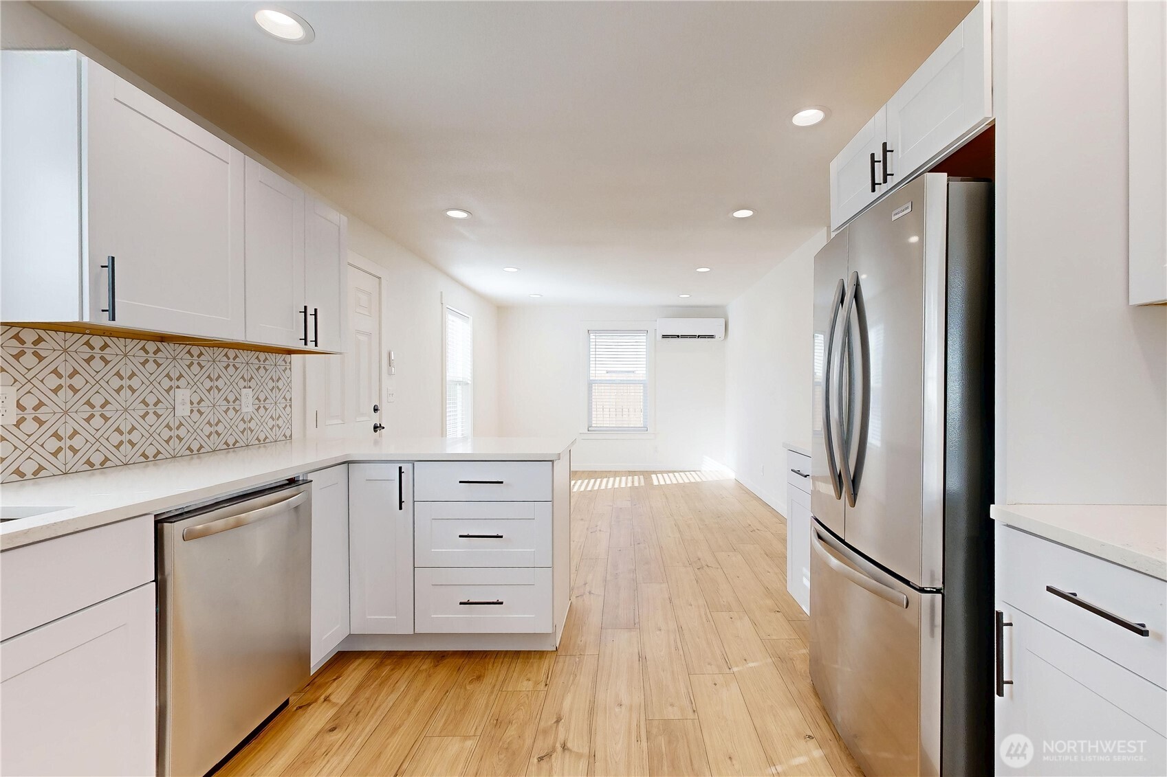 995 Hobson Street Walla Walla, WA 99362 - Photo 8 of 38 a kitchen with stainless steel appliances a refrigerator and cabinets