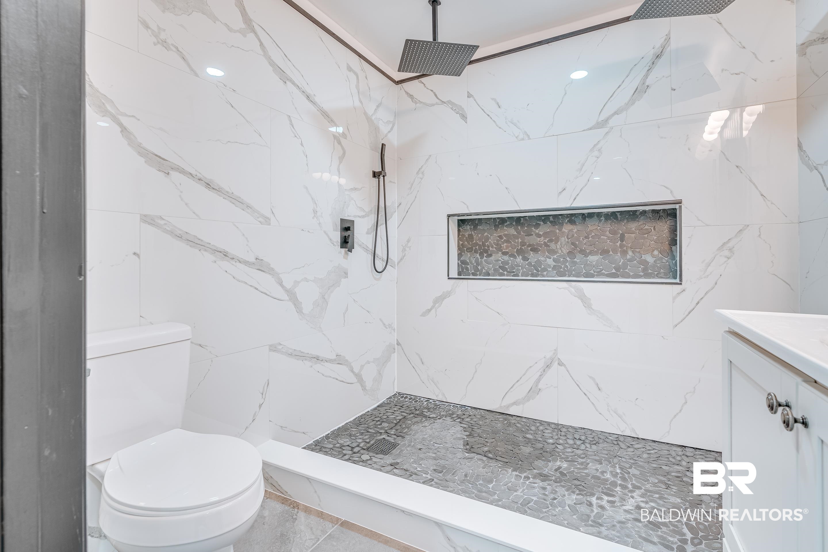 1190 Military Road Mount Vernon, AL 36560 - Photo 28 of 47 Full bathroom with a marble finish shower and vanity