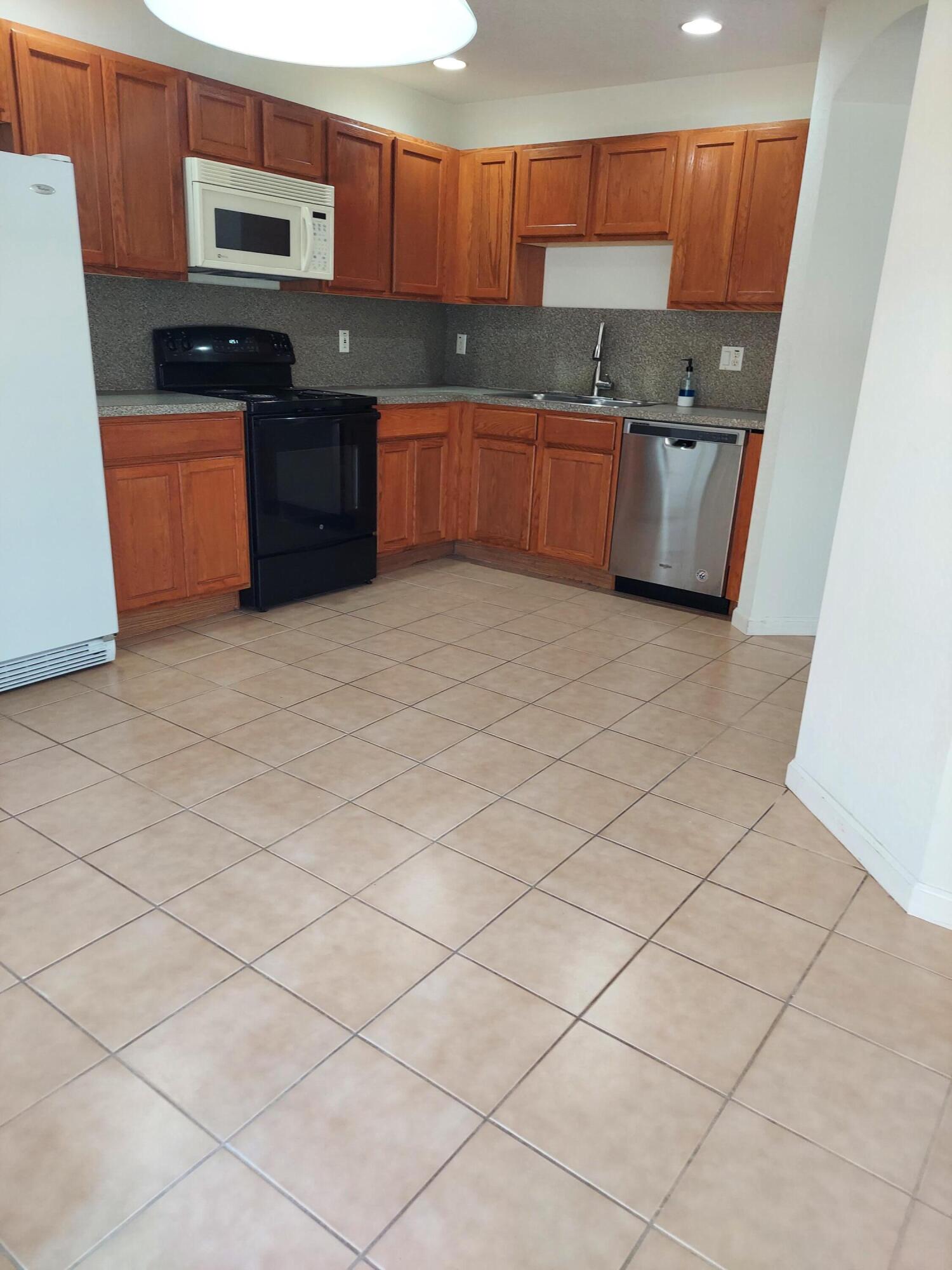 5301 Crossing Rocks Court Riviera Beach, FL 33407 - Photo 5 of 40 20211227_125109