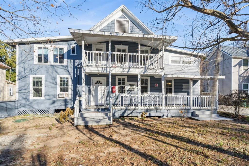 a front view of a house with yard