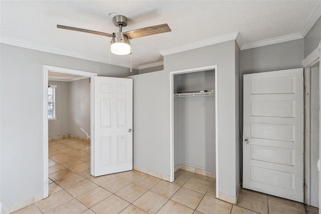 113 South Grove Street, Unit 2 Eustis, FL 32726 - Photo 11 of 15 wooden floor in an empty room