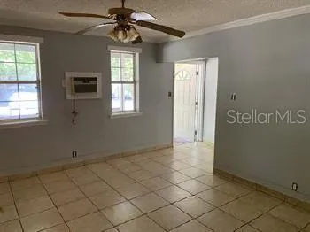 a view of an empty room and window