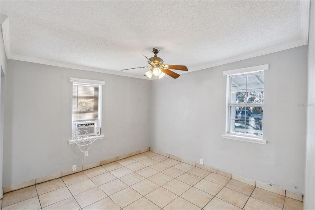 113 South Grove Street, Unit 2 Eustis, FL 32726 - Photo 10 of 15 a view of an empty room with window