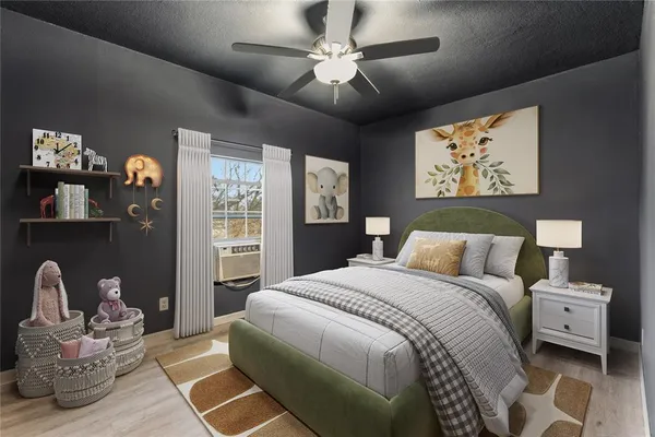 a bedroom with a bed a couch and a window