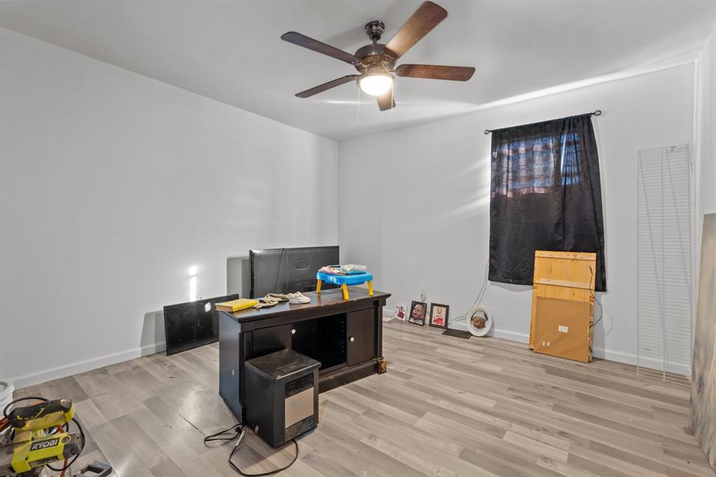 9201 Farmers Road White Settlement, TX 76108 - Photo 28 of 35 a work room with furniture and wooden floor