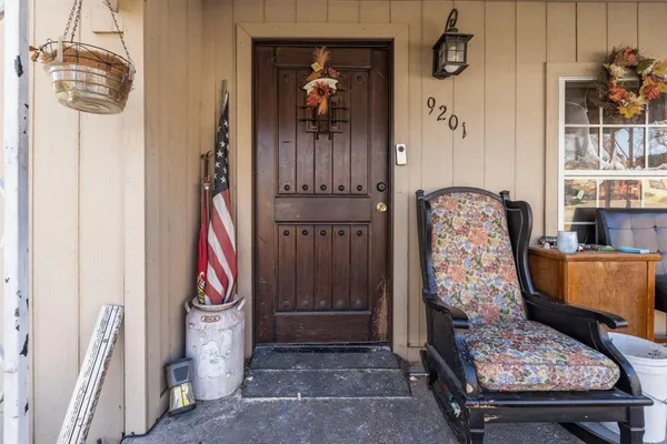 a bed room with a bed and a window