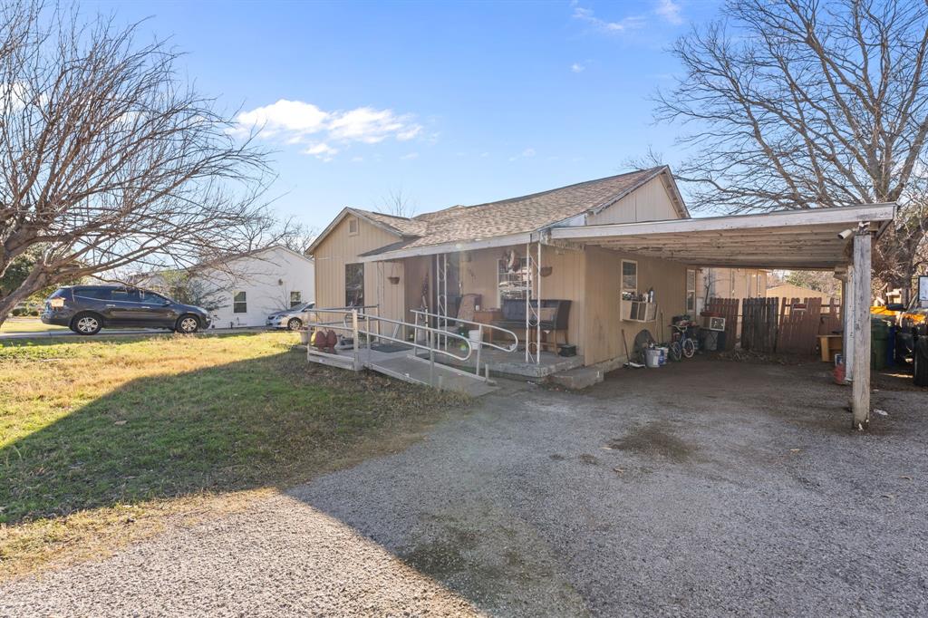 9201 Farmers Road White Settlement, TX 76108 - Photo 4 of 35 a view of a house with a yard covered in snow