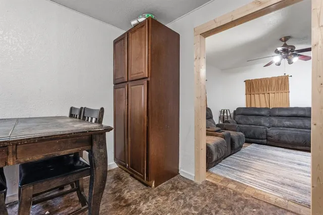 a bed room with a bed and dresser