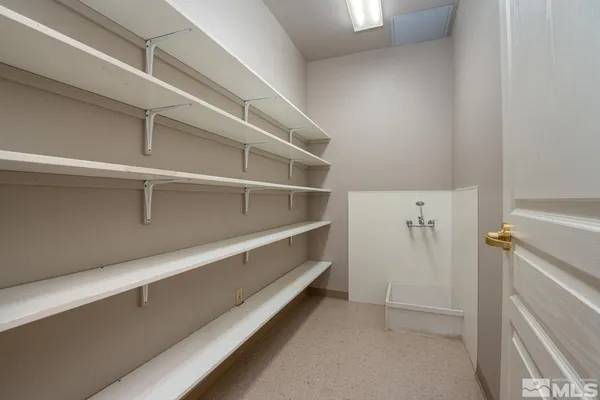 a view of an empty walk in closet