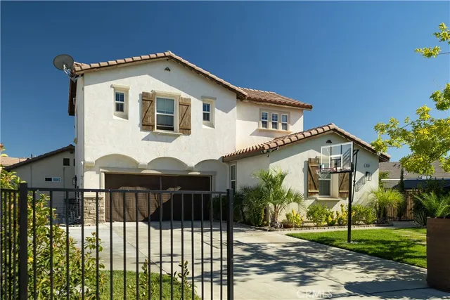 a front view of a house with glass windows