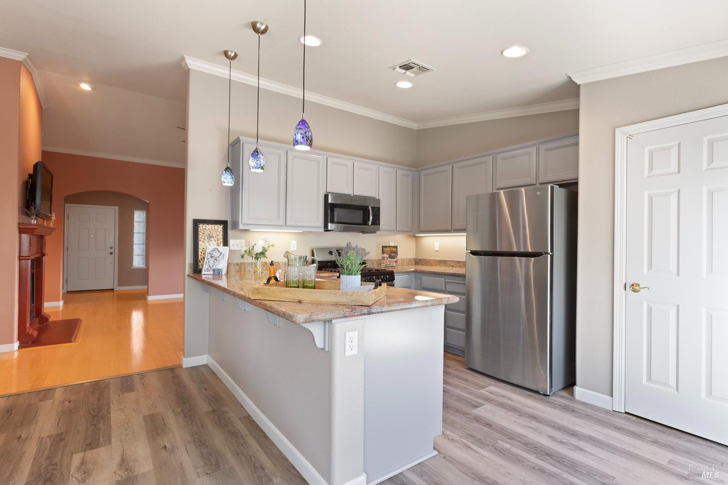 270 Foxwood Lane Rio Vista, CA 94571 - Photo 15 of 31 a kitchen with kitchen island a refrigerator sink and stove