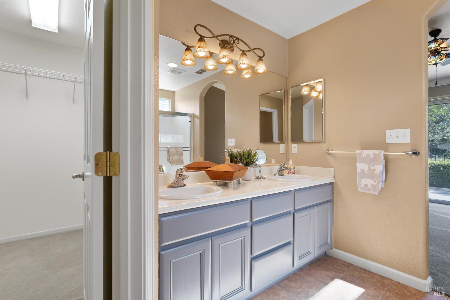 270 Foxwood Lane Rio Vista, CA 94571 - Photo 23 of 31 a bathroom with a granite countertop sink a large mirror and a shower