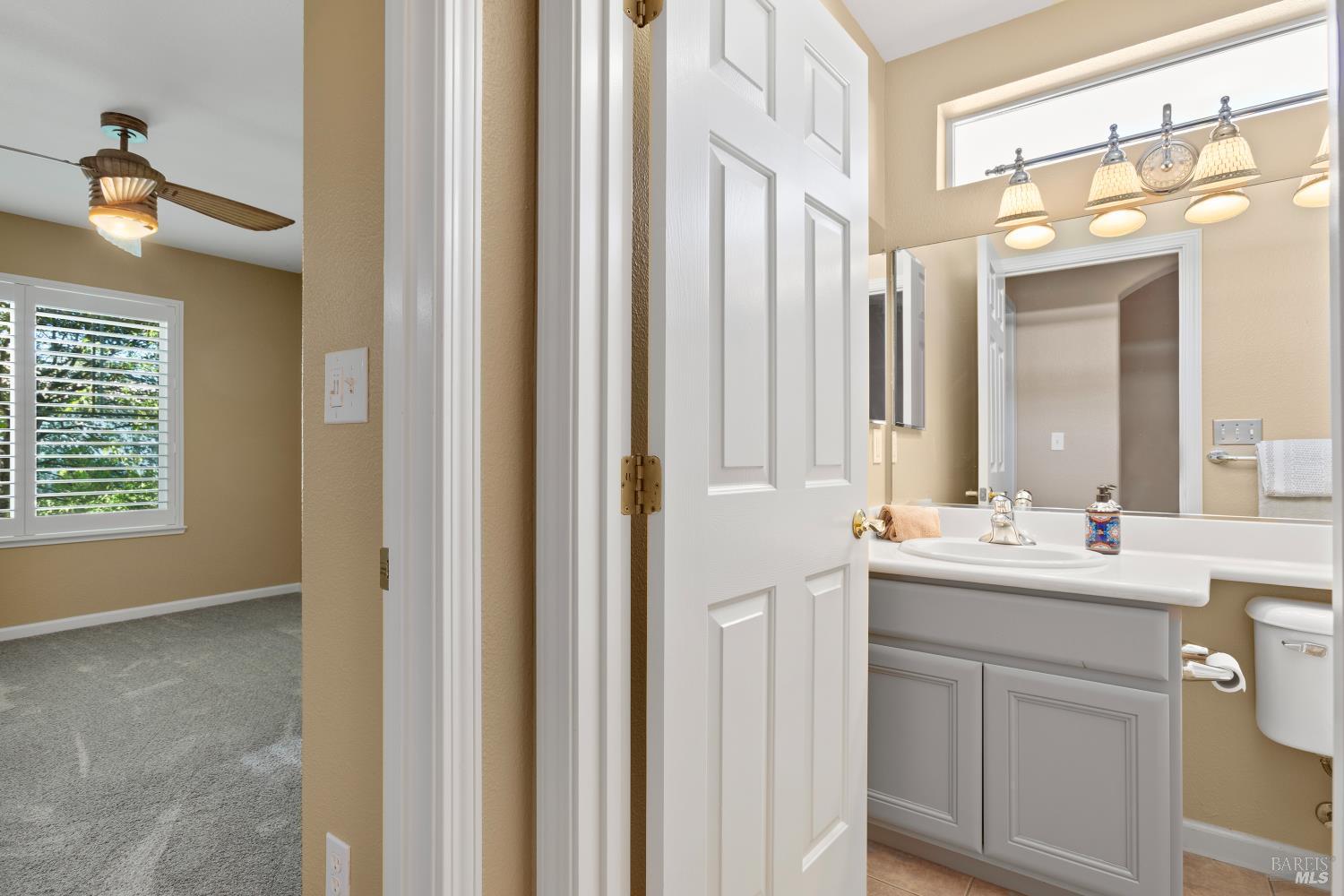 270 Foxwood Lane Rio Vista, CA 94571 - Photo 27 of 31 a bathroom with a double vanity sink mirror and next to a window
