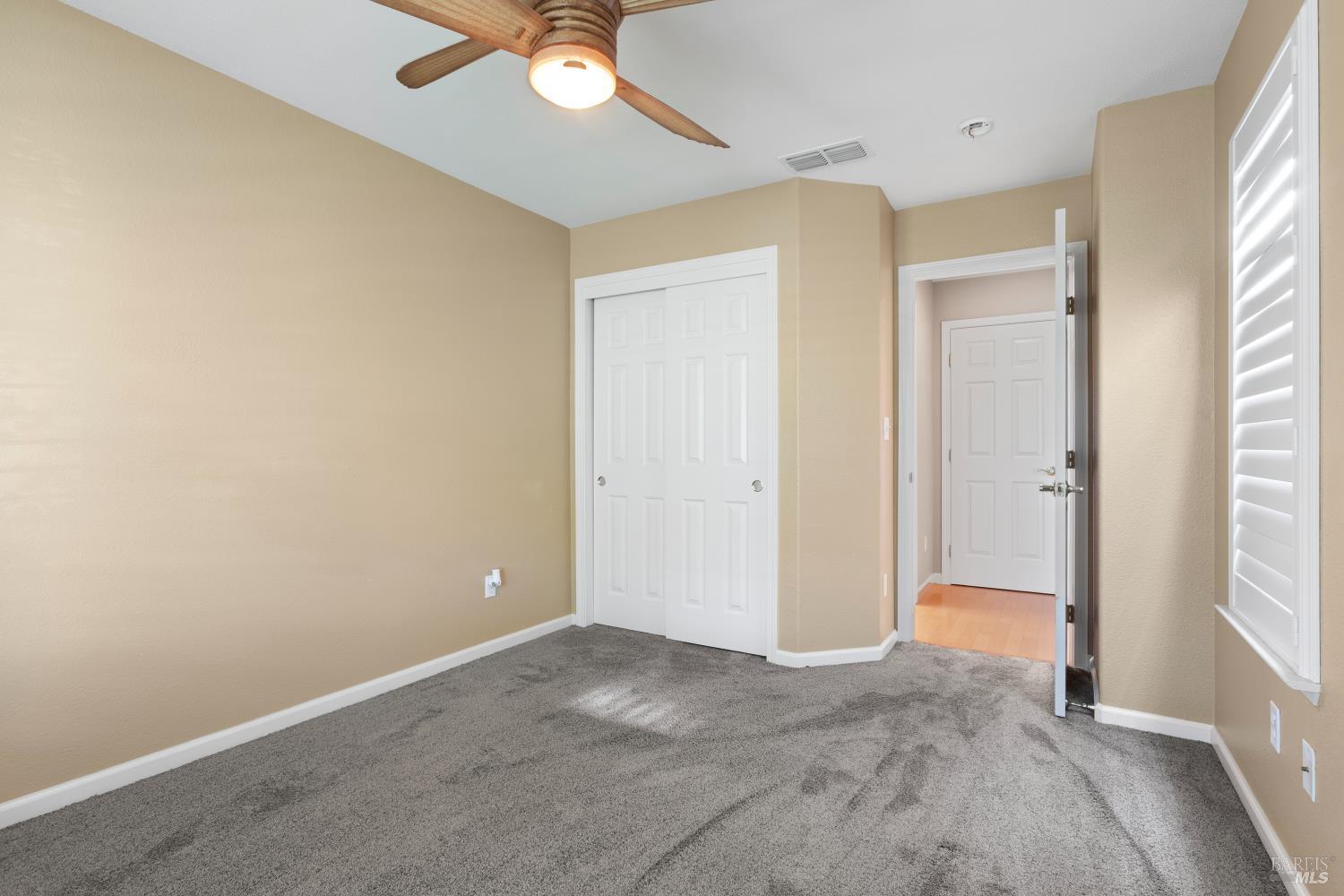 270 Foxwood Lane Rio Vista, CA 94571 - Photo 30 of 31 an empty room with windows and fan