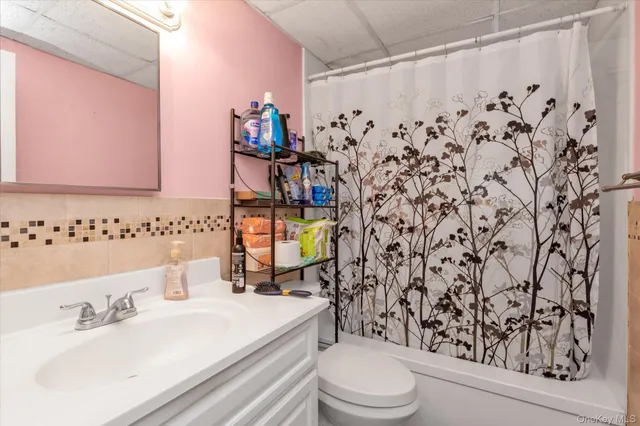 a front view of a house with outdoor seating