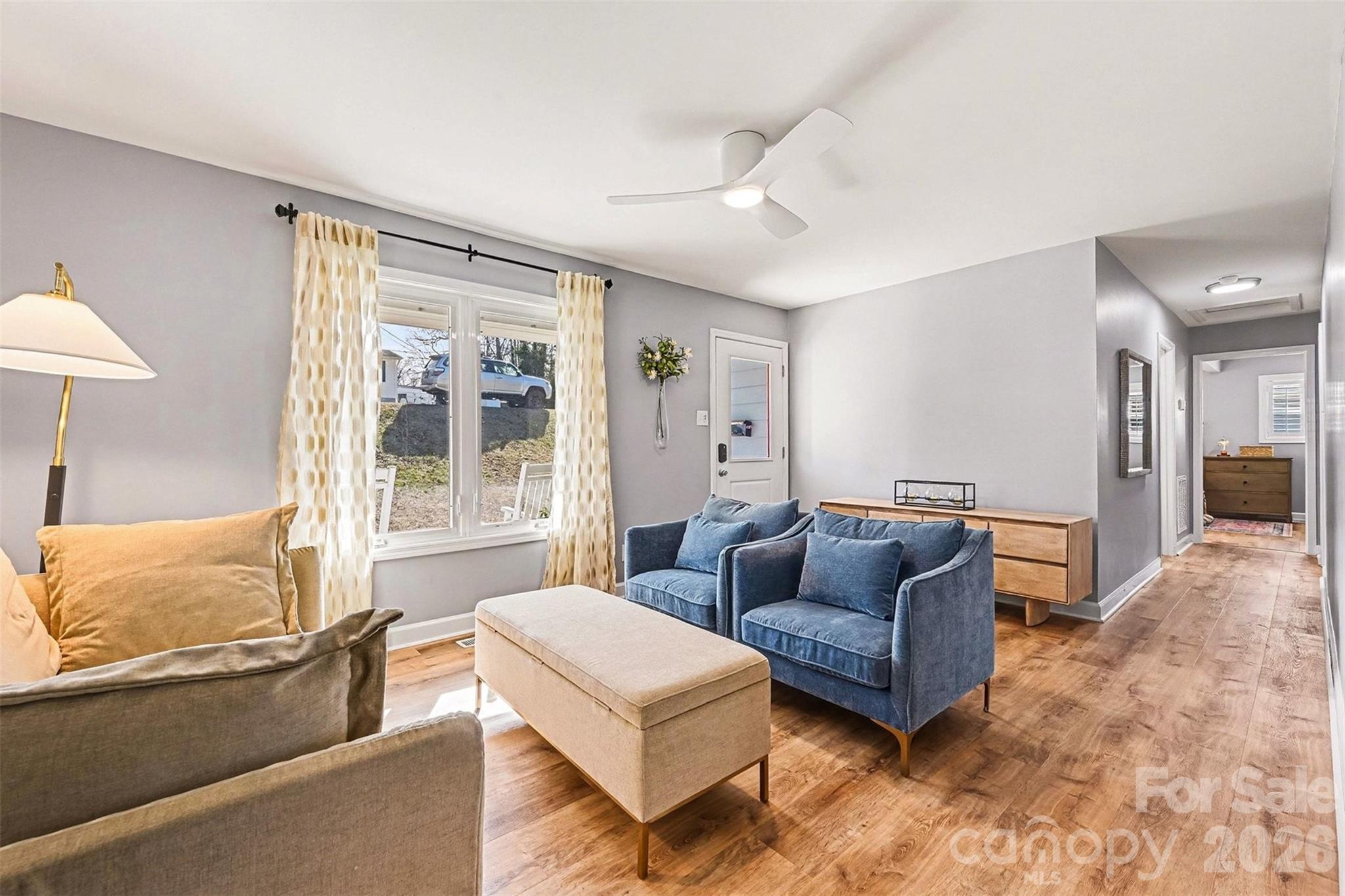 300 Calhoun Street Fort Mill, SC 29715 - Photo 2 of 30 a living room with furniture and a large window