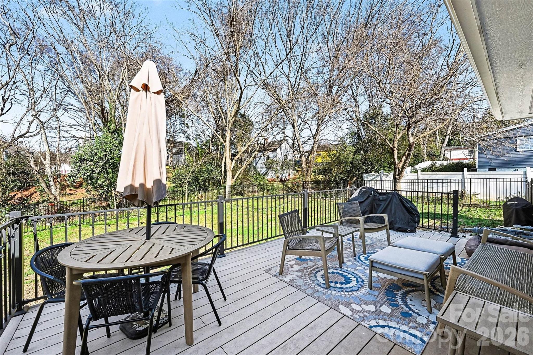 300 Calhoun Street Fort Mill, SC 29715 - Photo 23 of 30 a view of a table and chairs on the roof deck