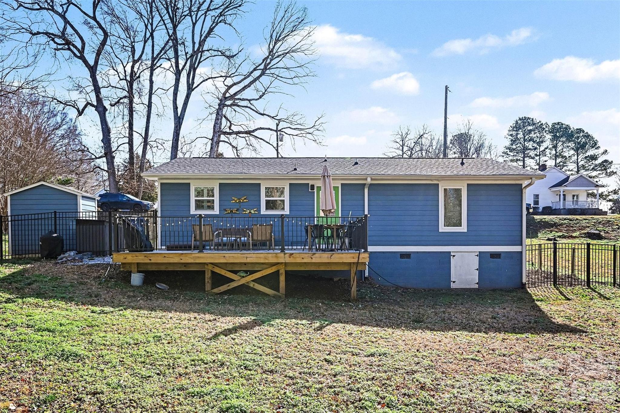 300 Calhoun Street Fort Mill, SC 29715 - Photo 25 of 30 a view of a house with a wooden fence