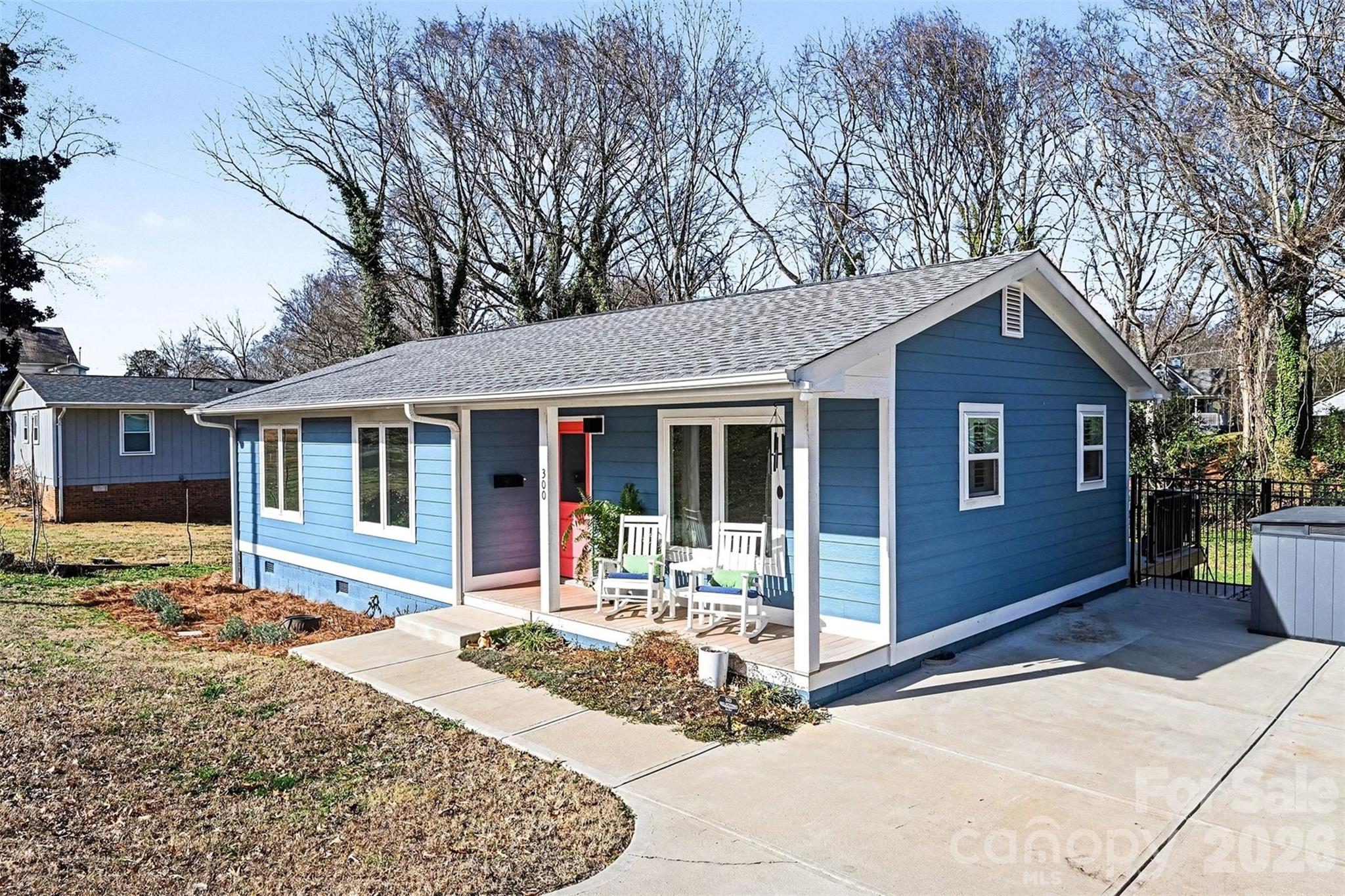 300 Calhoun Street Fort Mill, SC 29715 - Photo 29 of 30 a front view of a house with yard outdoor seating and pathway
